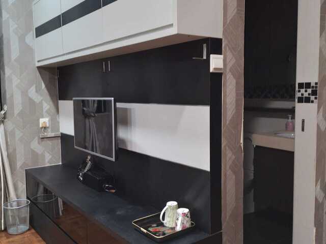 D15 3rd floor Front window bedroom _ shared kitchen and common area with other tenanted room