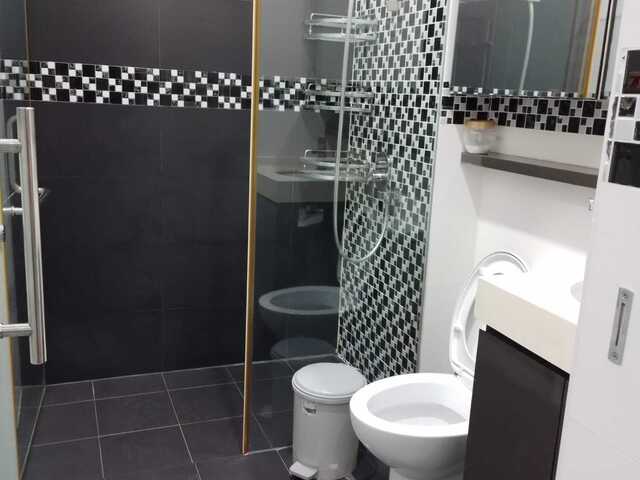 D15 3rd floor Front window bedroom _ shared kitchen and common area with other tenanted room