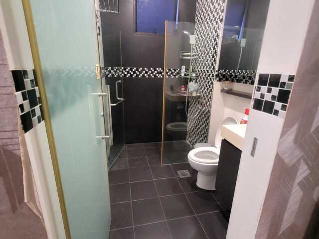 D15 3rd floor Front window bedroom _ shared kitchen and common area with other tenanted room