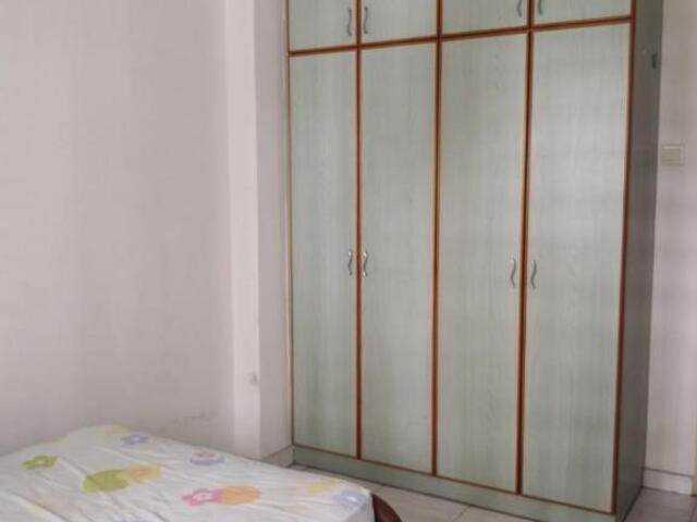 A cosy common room for one working professional