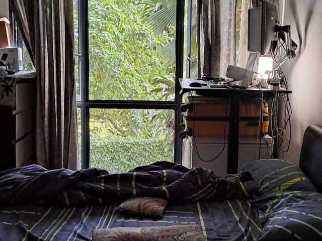 Common Bedroom with queen bed and storage