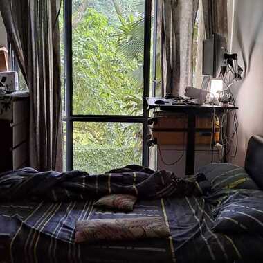 Common Bedroom with queen bed and storage